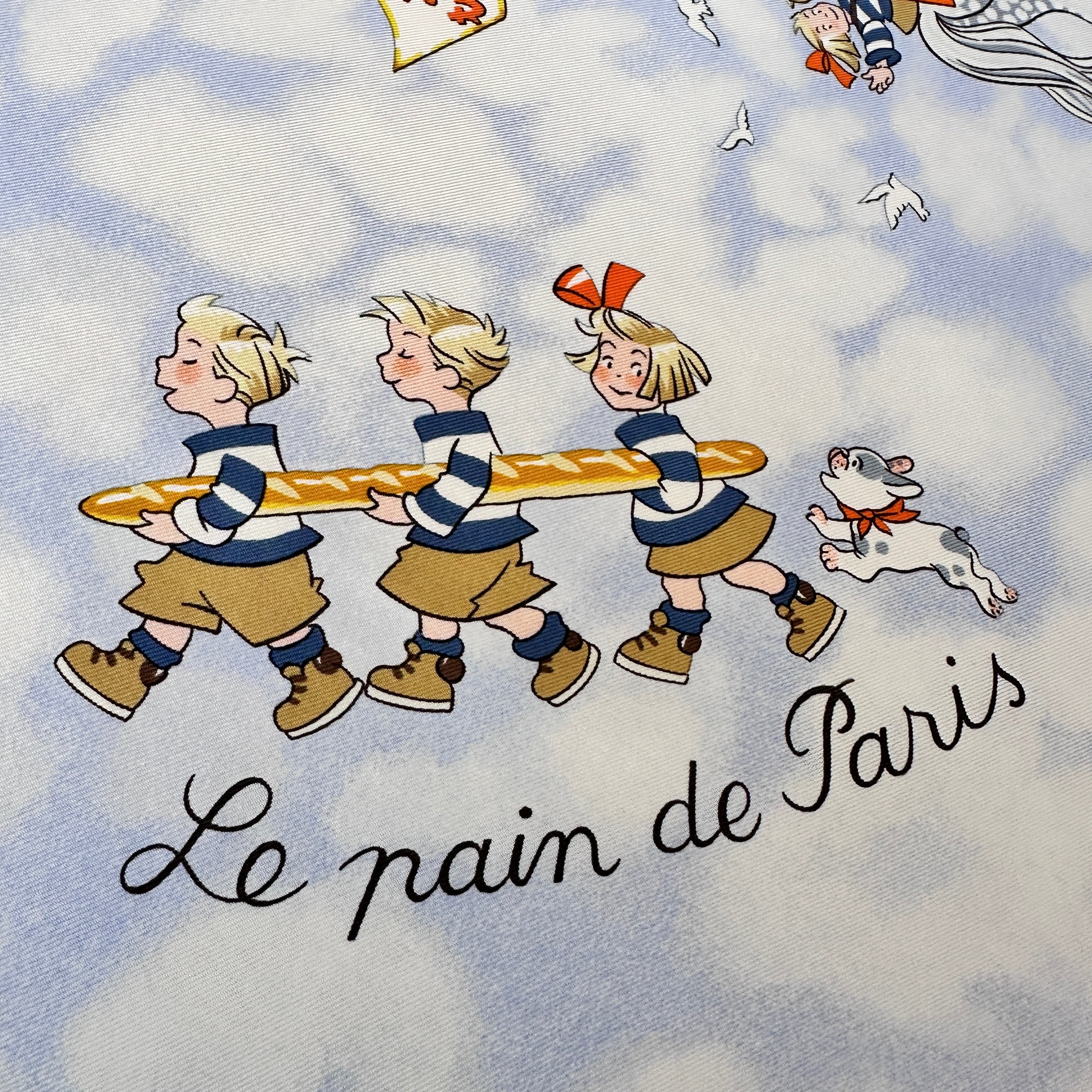 Les Triplés transportant une baguette géante, scène Le Pain de Paris.