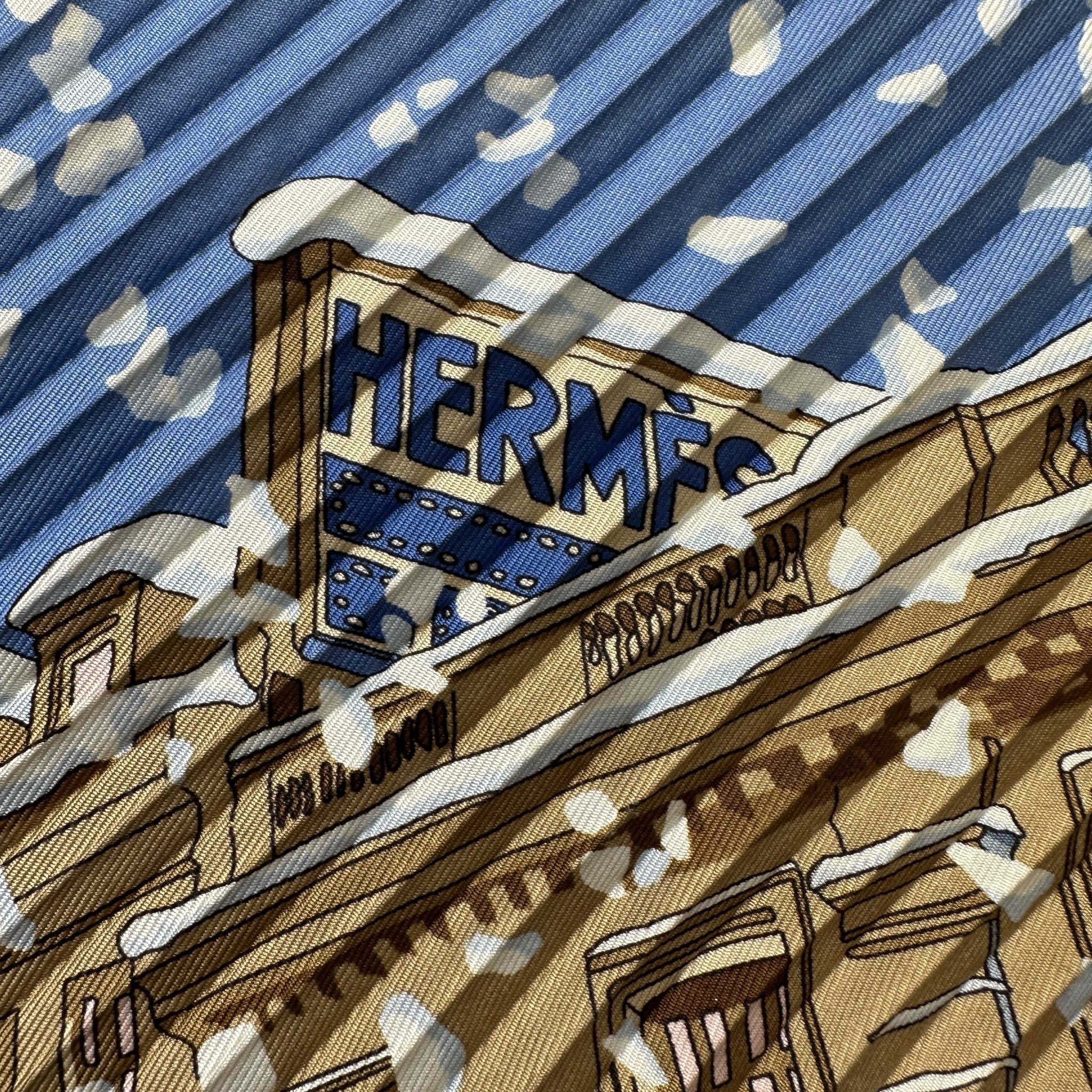 enseigne hermes sur le toit de l'immeuble 24 rue du Faubourg saint honore